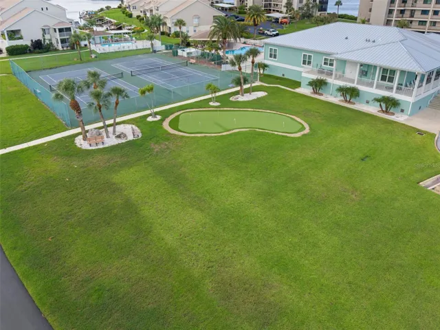 Putting green, tennis and clubhouse
