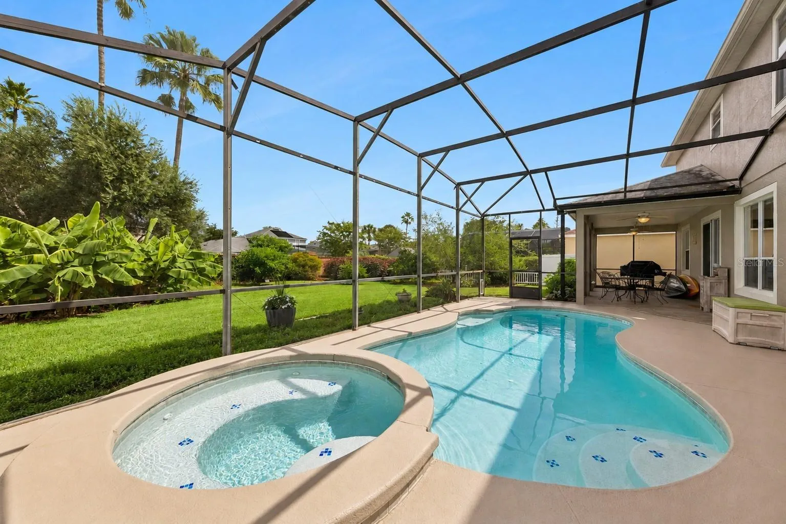 Screen Enclosed Heated Pool and Spa
