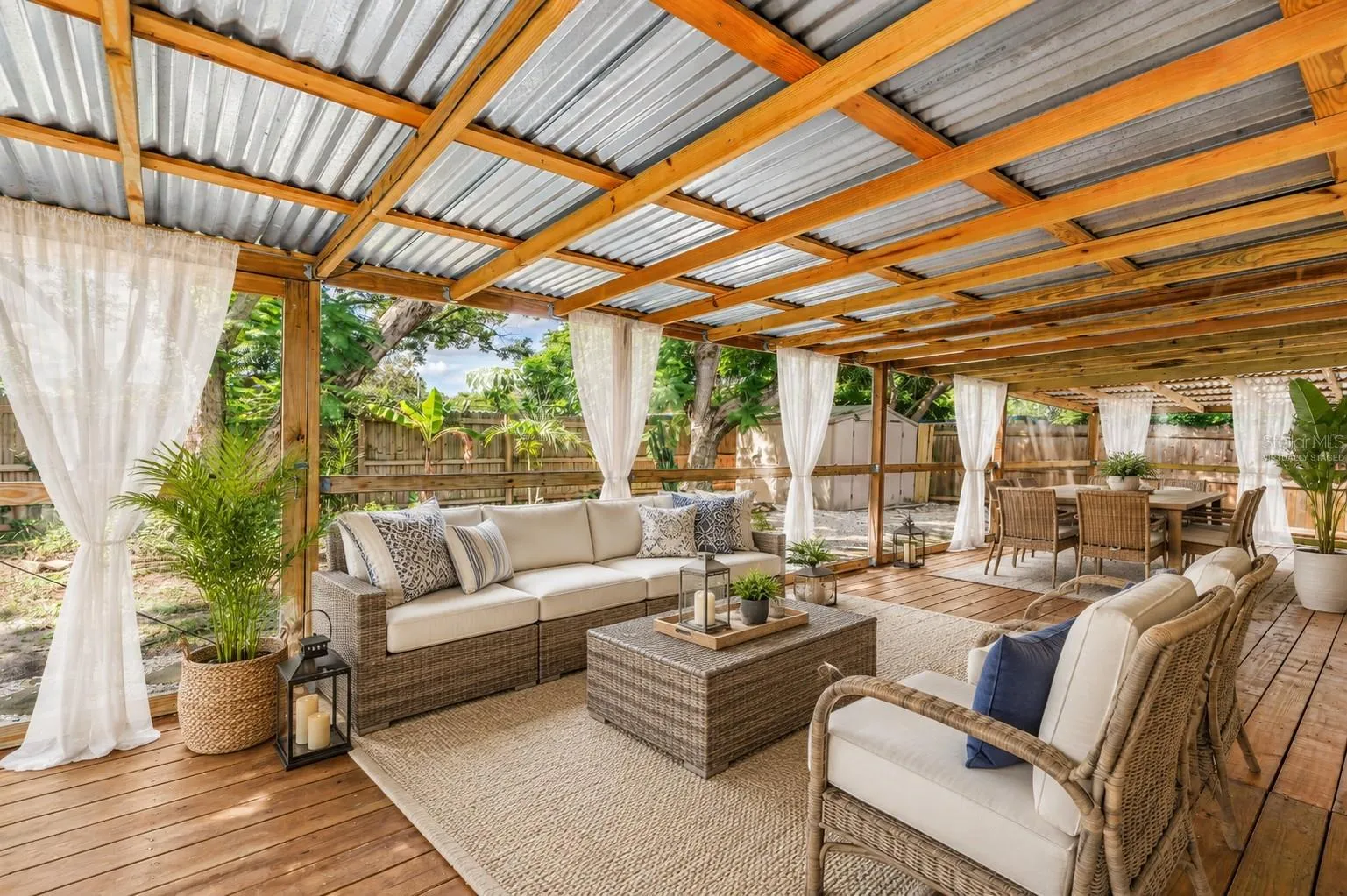 Impressive screen enclosed covered patio, virtually staged