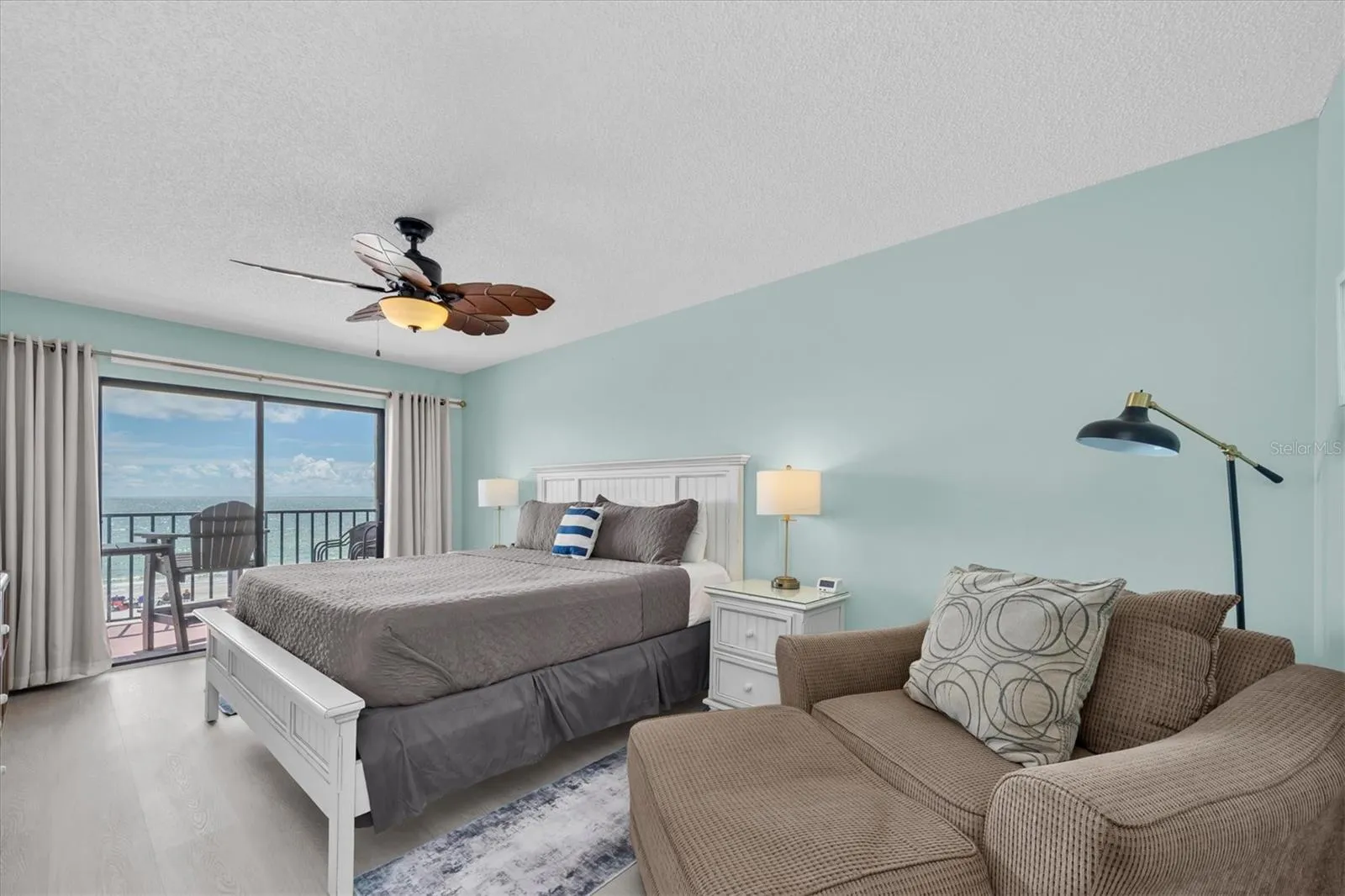 Primary bedroom with access to balcony with amazing views