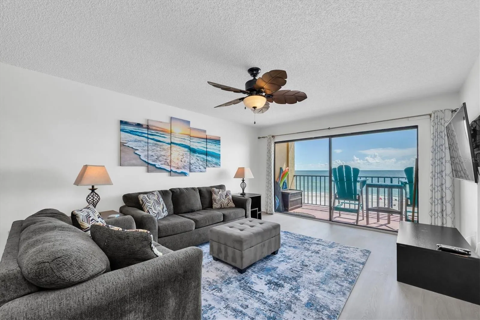 Large living room with balcony access and lovely views