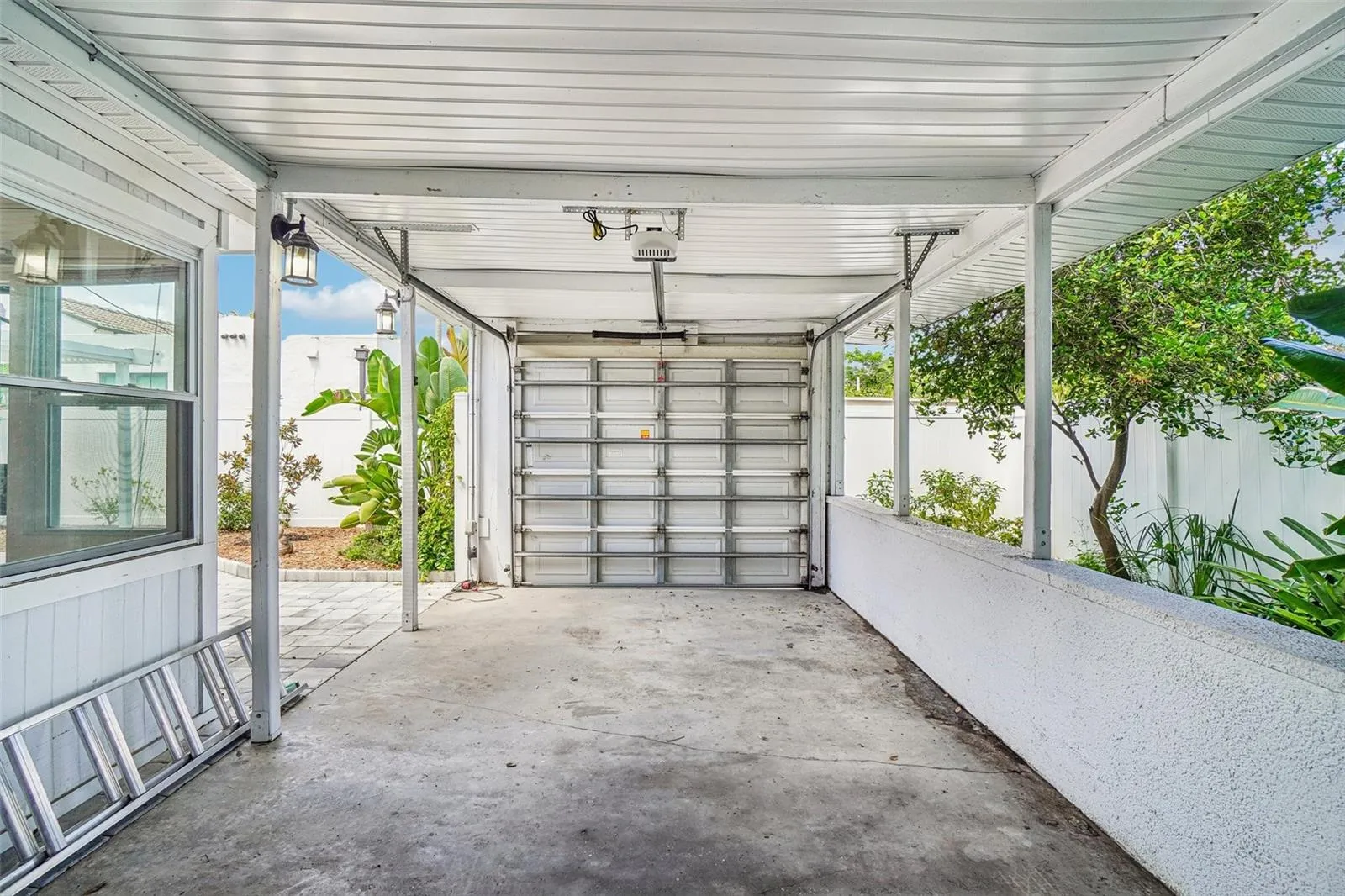 PARKING CARPORT, ENTRANCE THROUGH BACK ALLEY.