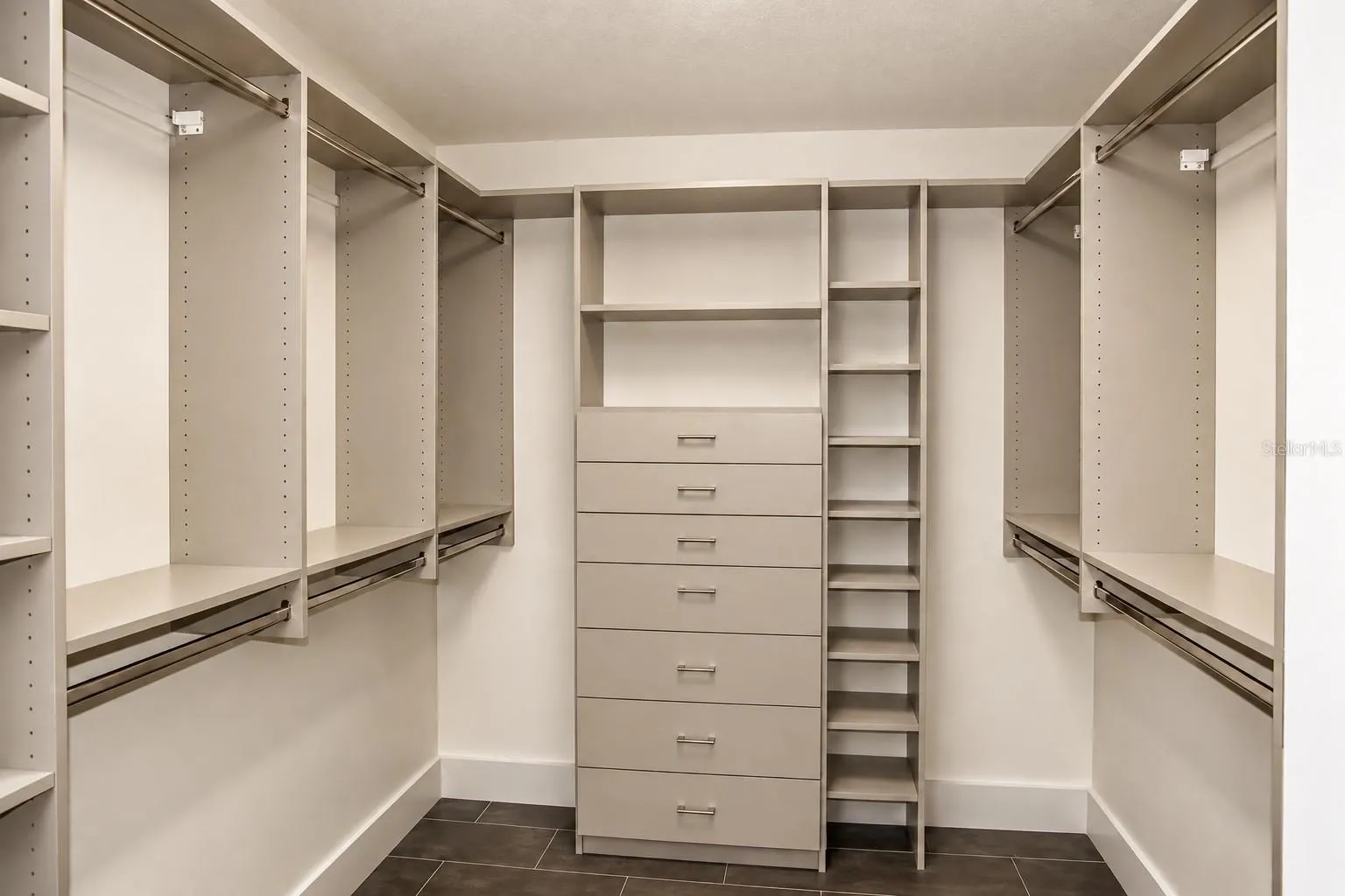 Walk-in closet with custom built-ins - 2