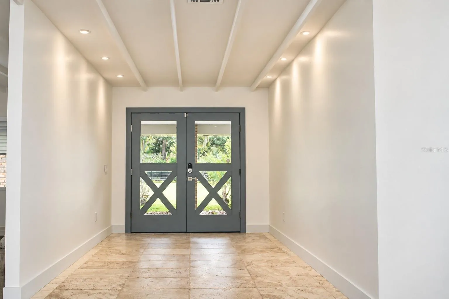 Symmetrical Foyer with Cross-Braced Doors