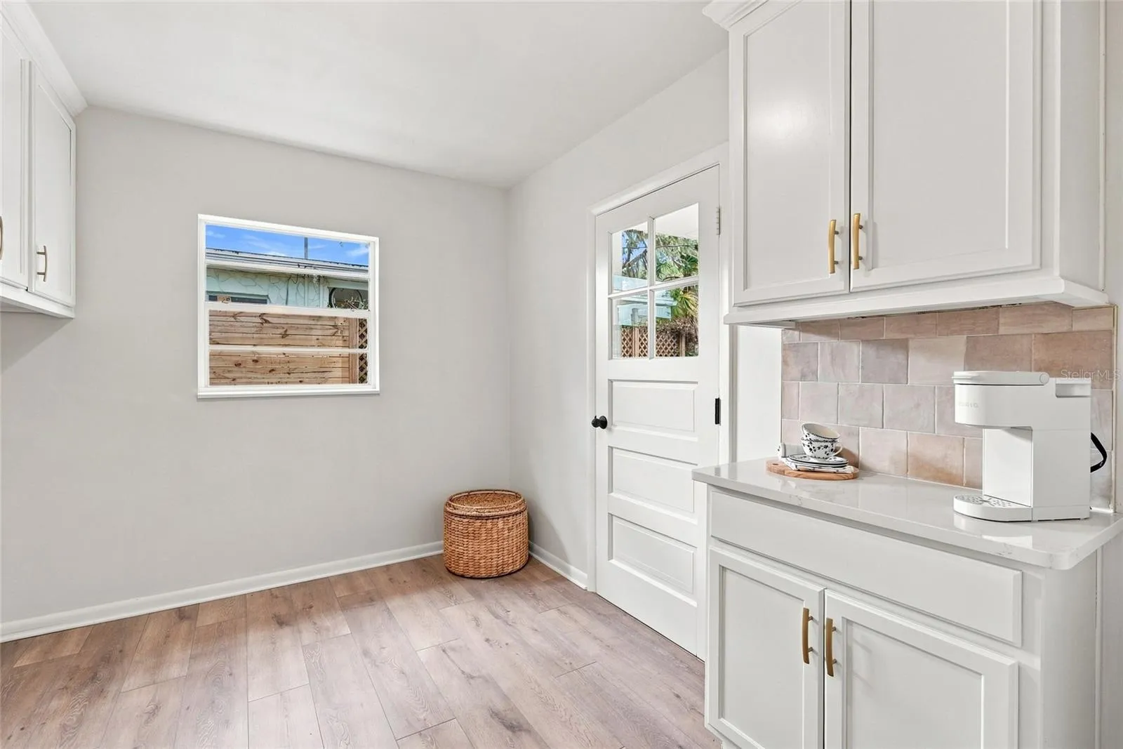 Inside Laundry Room with Built In Cabinets