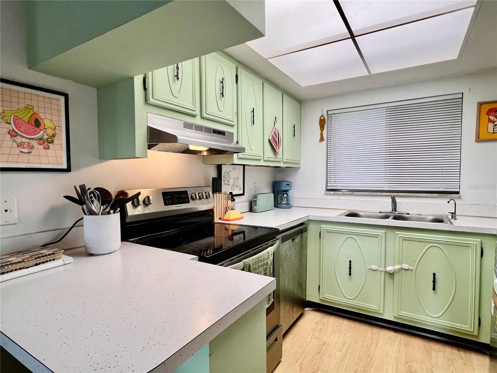 Kitchen is well appointed with loads of storage space and a dishwasher!