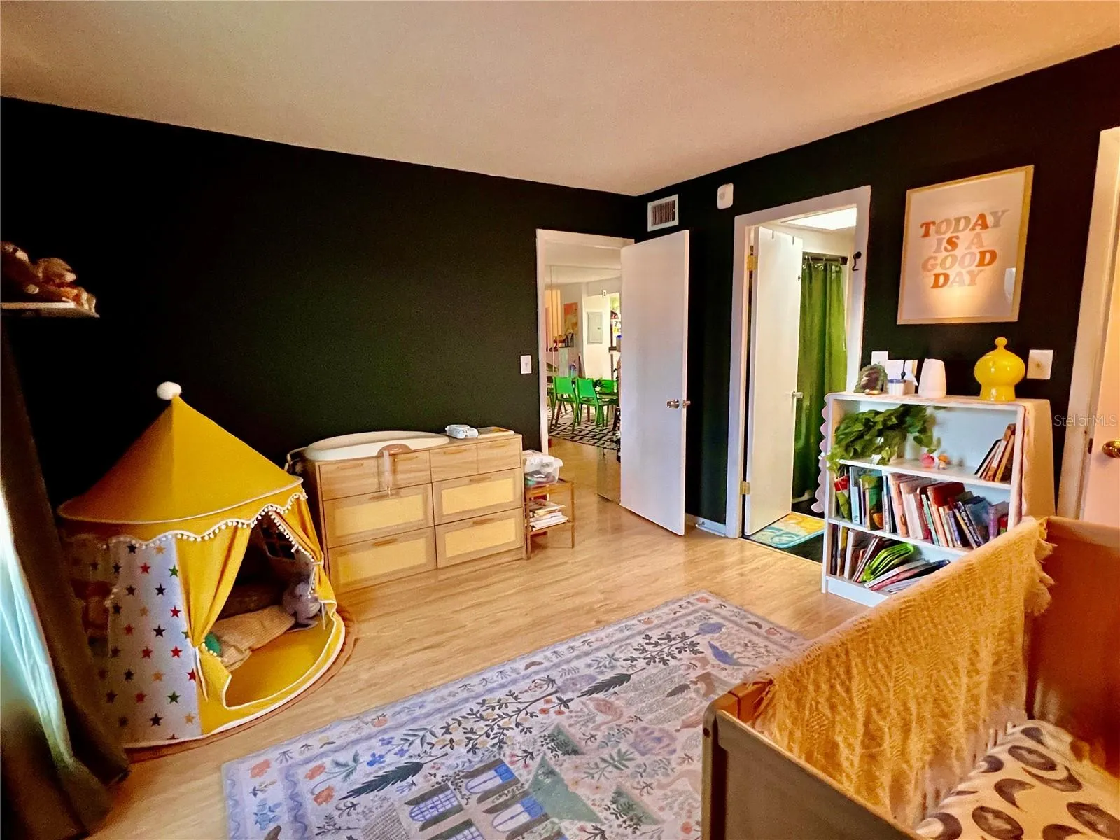 Large room with ensuite bathroom with combo tub/shower.