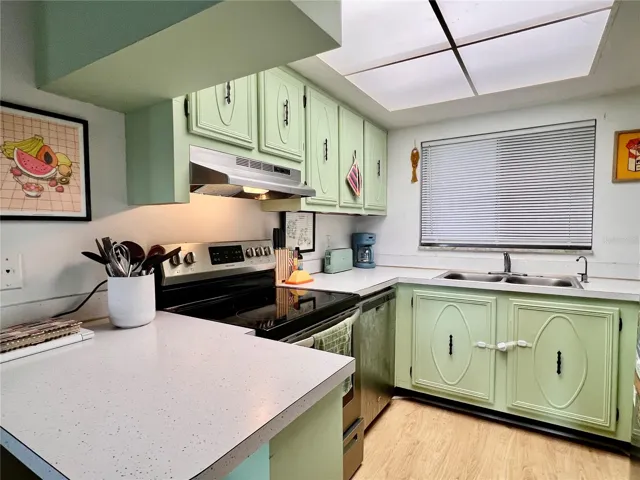Kitchen is well appointed with loads of storage space and a dishwasher!