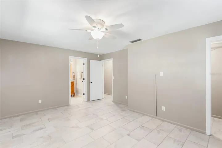 Primary Bedroom is light, airy and SPACIOUS!