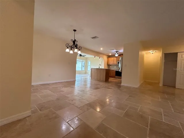 Dinning room adjacent to living room and kitchen for easy acess for entertaining and family gatherings.