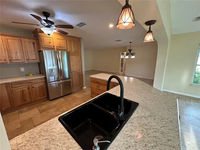 Double sinks ,Accent pendant lighting.