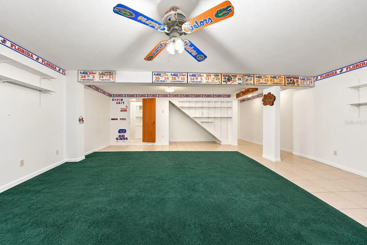 Bonus Room. This photo has been digitally cleaned up to remove personal items and clutter for a clearer view of the room and its layout.