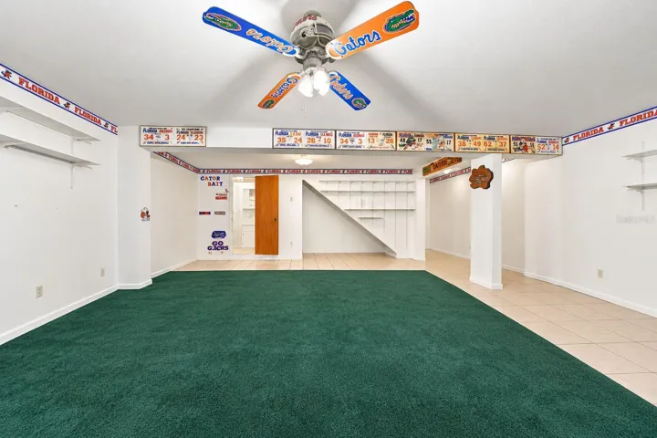 Bonus Room. This photo has been digitally cleaned up to remove personal items and clutter for a clearer view of the room and its layout.