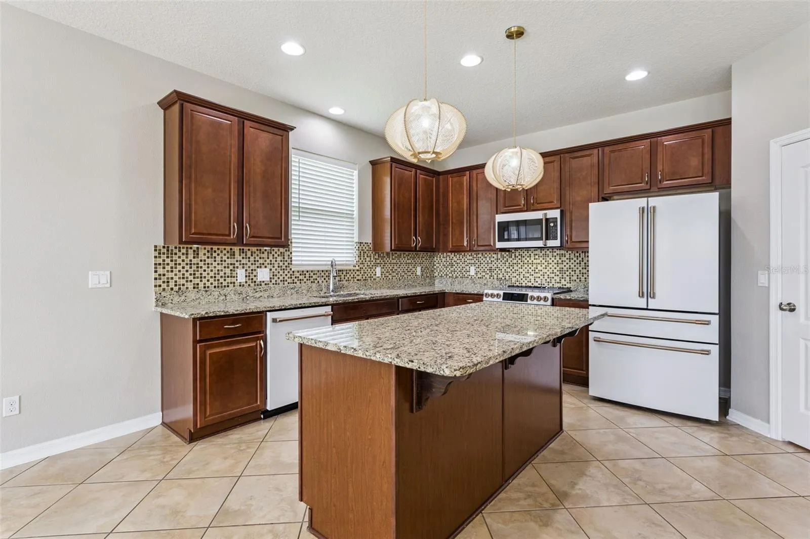 Granite Countertops and 42" wood cabinents