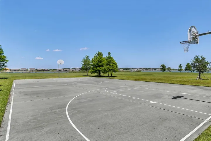 Community Basketball Courts overlooking the private Waterside Pointe lake.