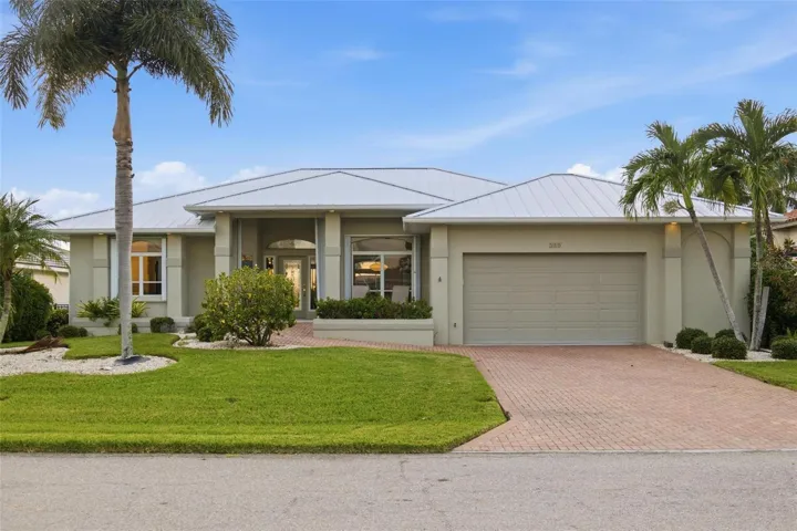 Beautiful home with western facing lanai and no bridges to the harbor!