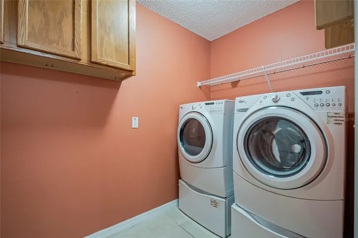 Laundry room with washer and dryer