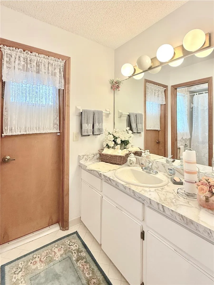 Bathroom 2 leads to the pool