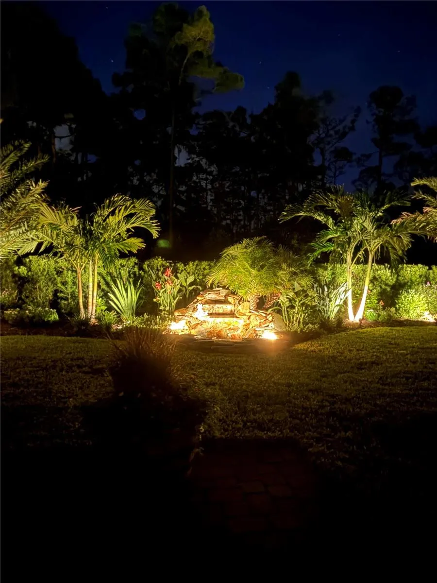 Backyard fountain at night