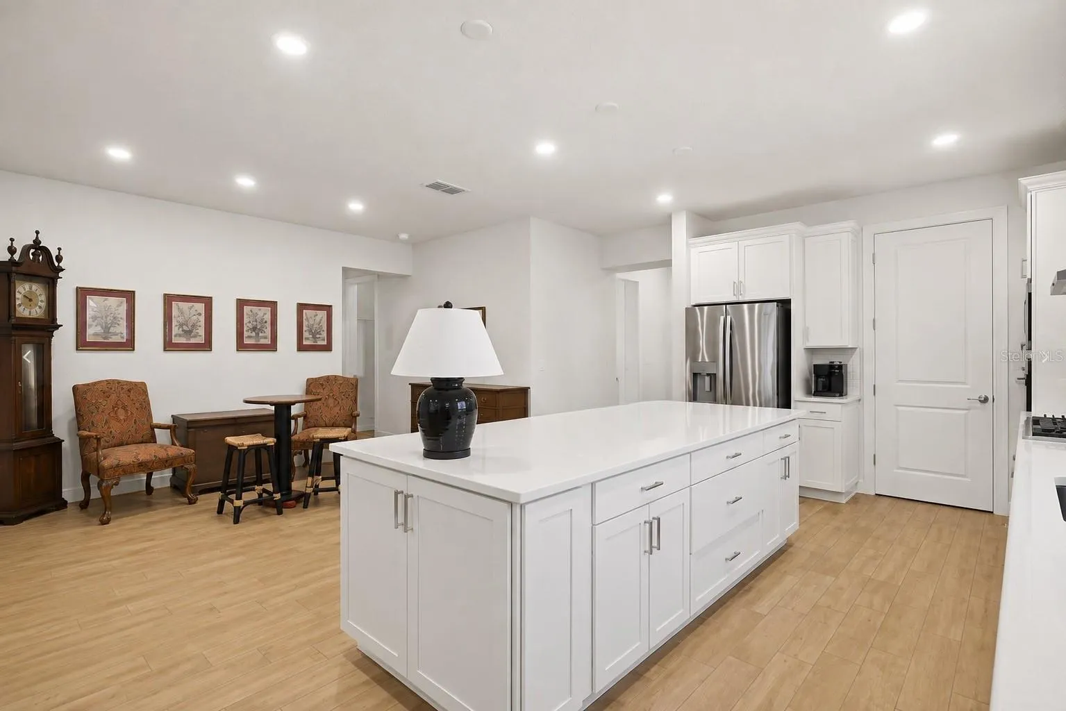 Looking into dining area space from kitchen