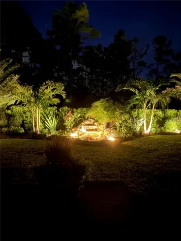 Backyard fountain at night