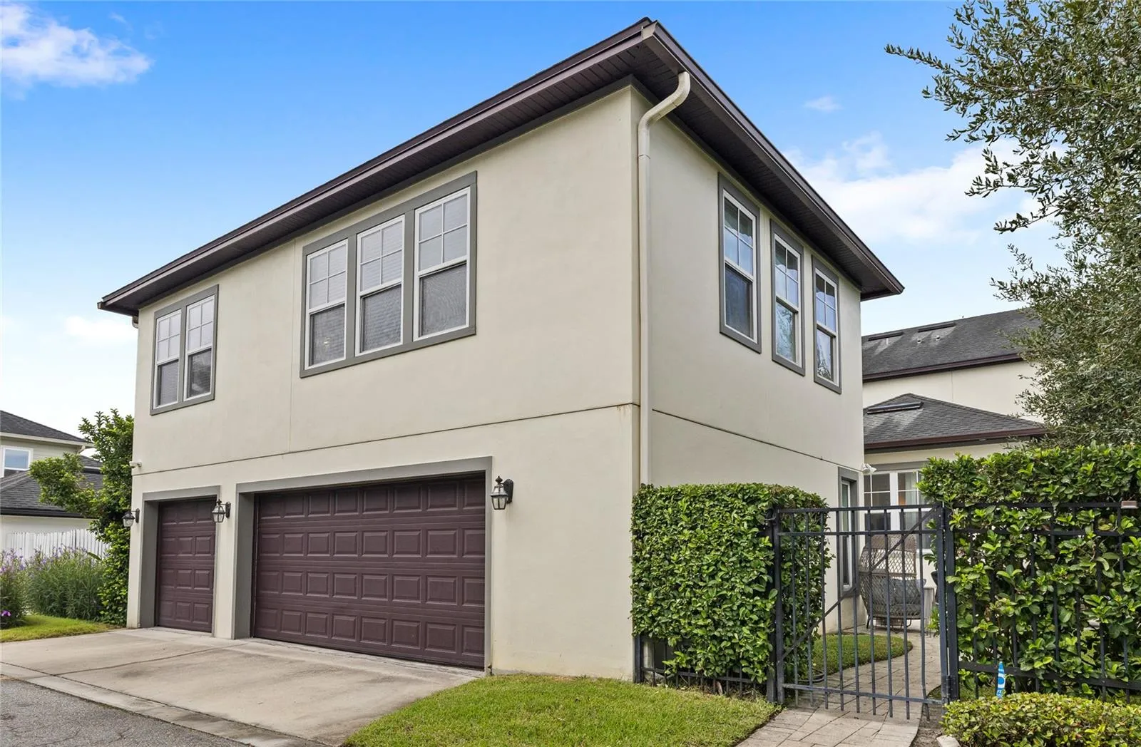 Rear Exterior, 3-Car Garage, Apartment