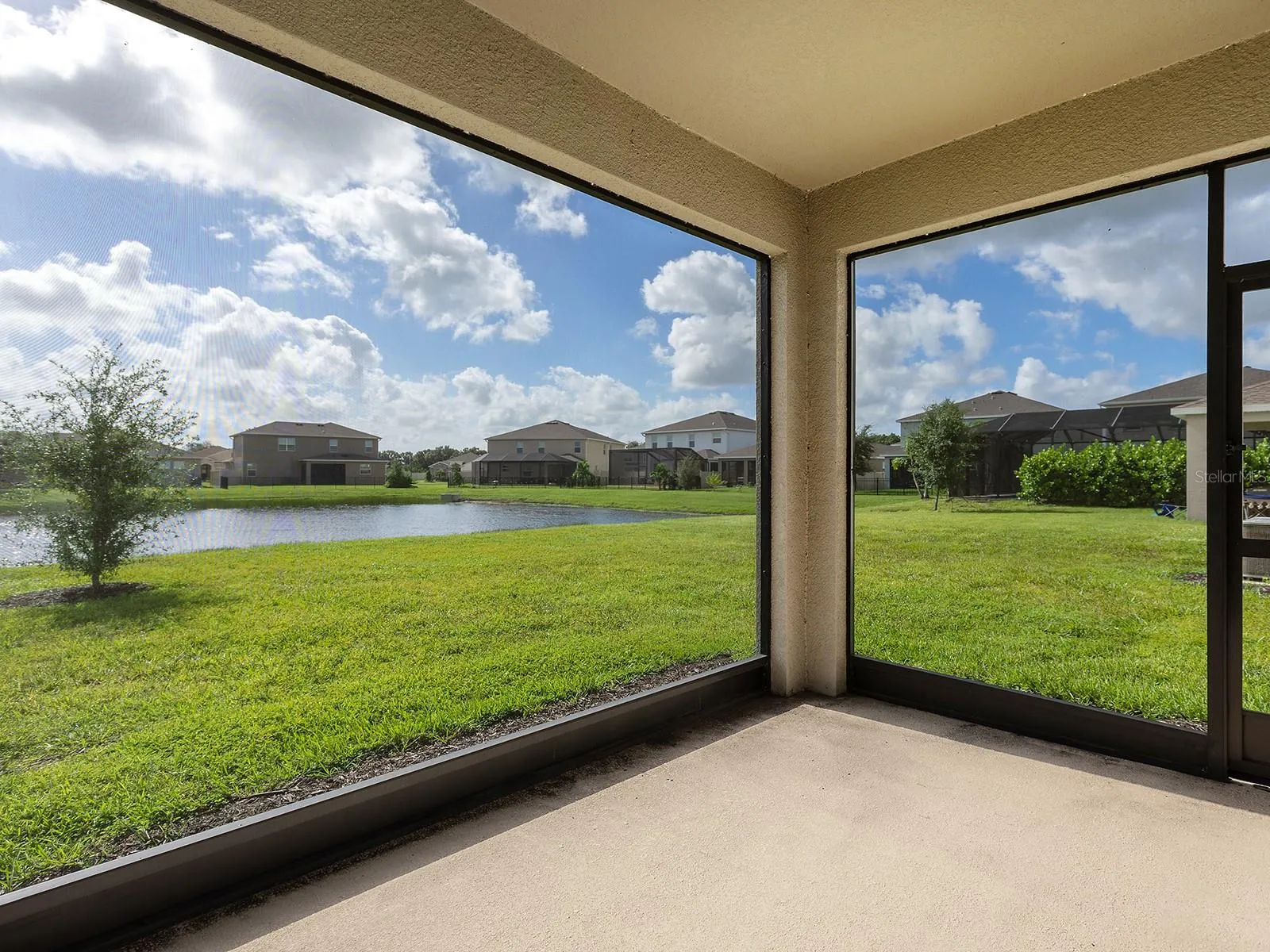 screened lanai with lake views