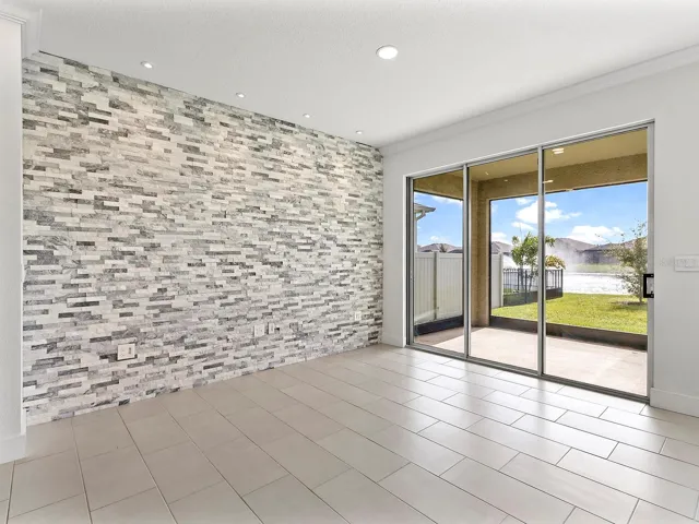 Formal dining room with accent wall stone