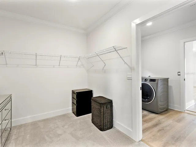 laundry room off the primary walk-in closet