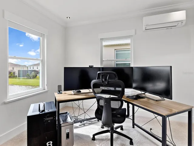 Siting room off the primary bedroom or second office