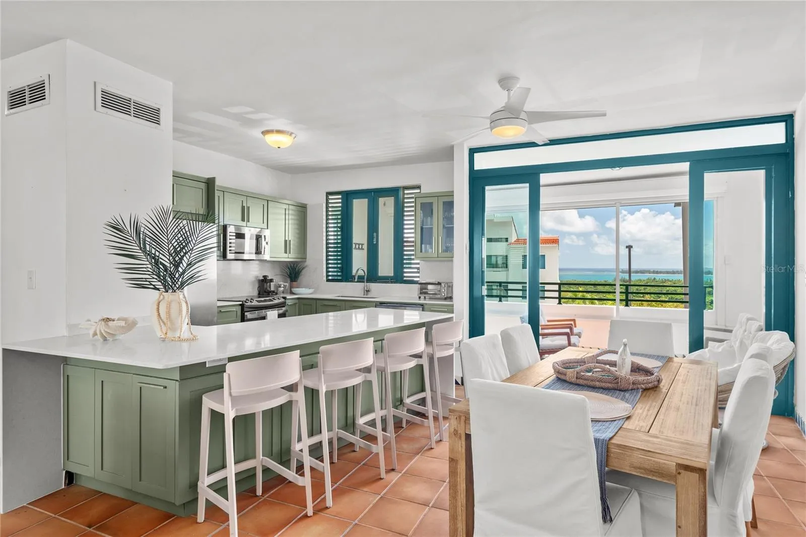 Dining room and kitchen, water views from inside
