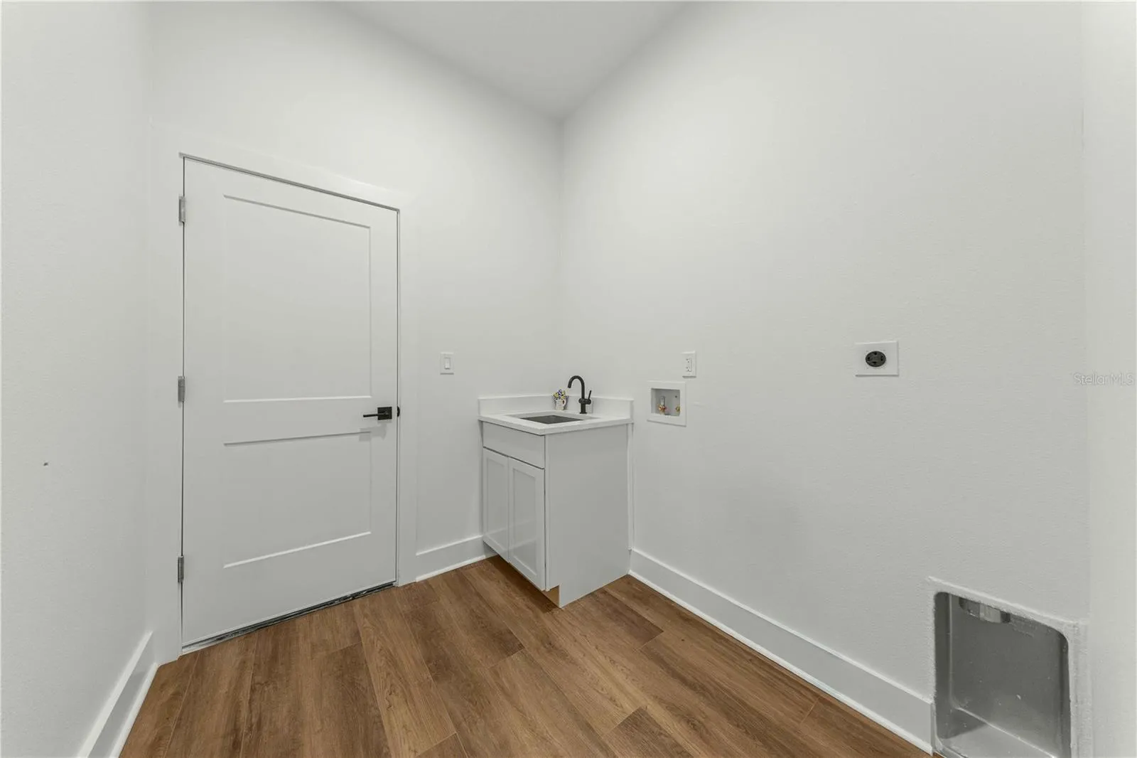 laundry room with sink