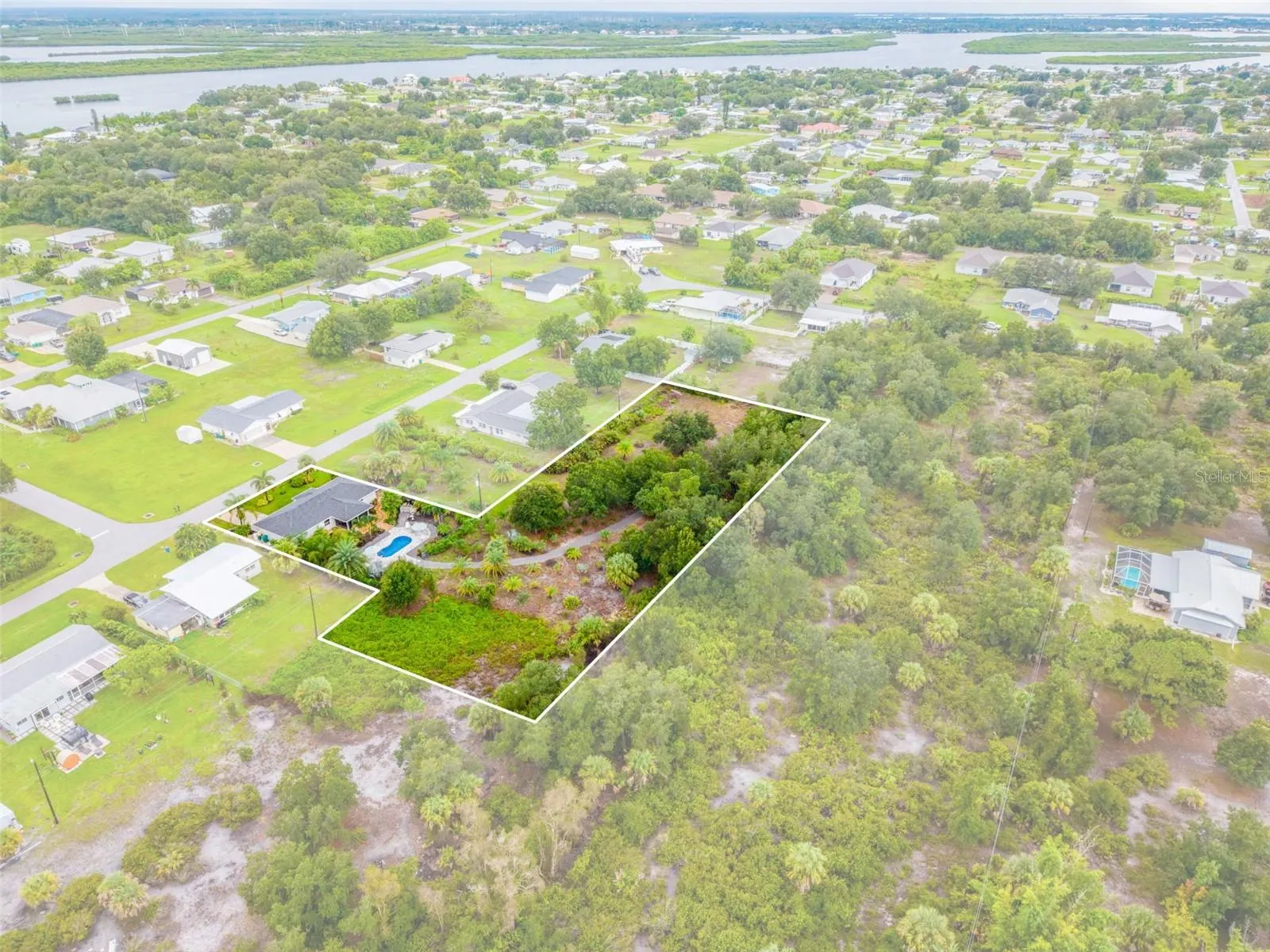 Opportunity Knocks With Incredible Pool Home On Devine Acreage