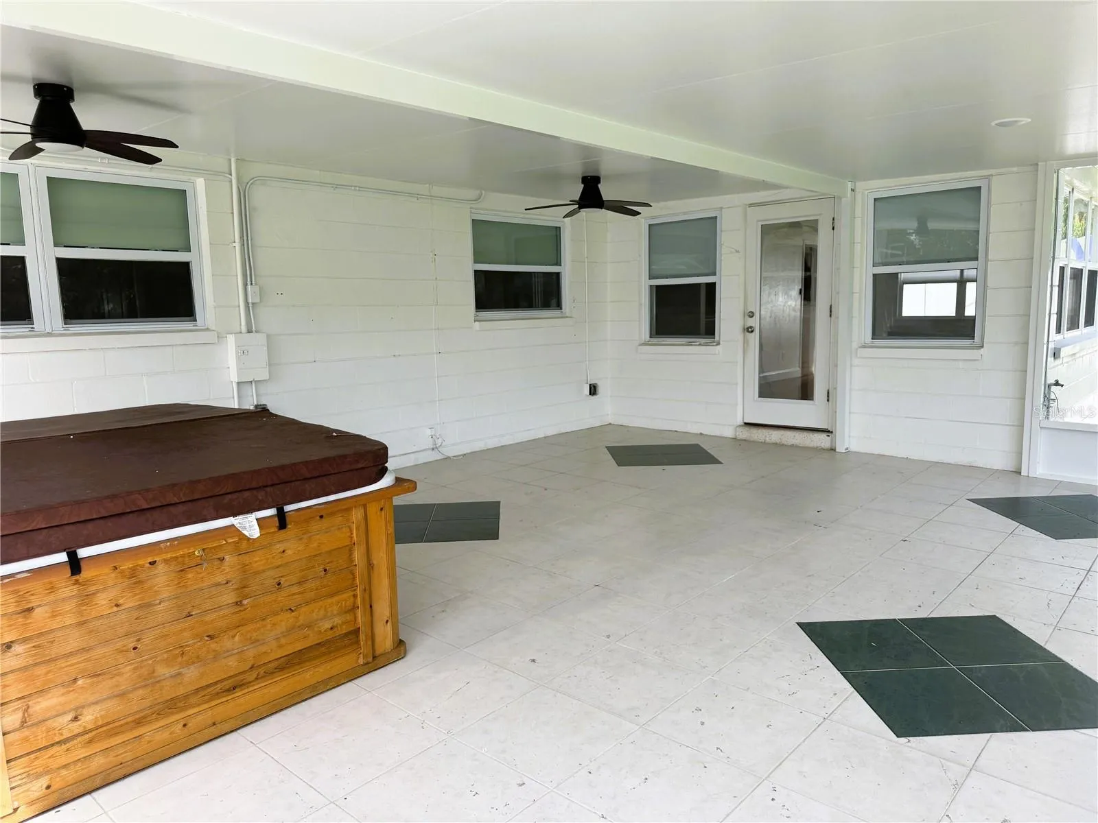 Enclosed Rear Patio with Hot Tub