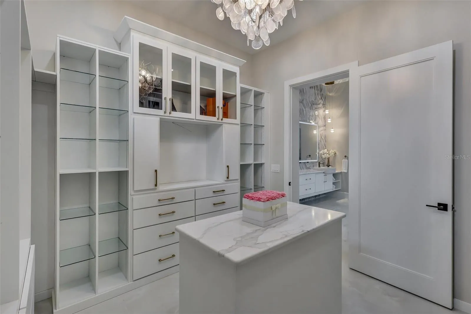 Beautifully appointed dressing room combines display, storage and organization