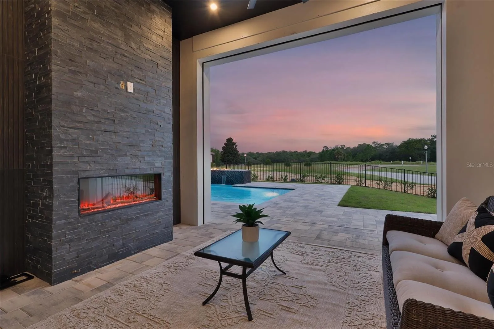 Private Primary Suite fireside retreat creates with drop down screens