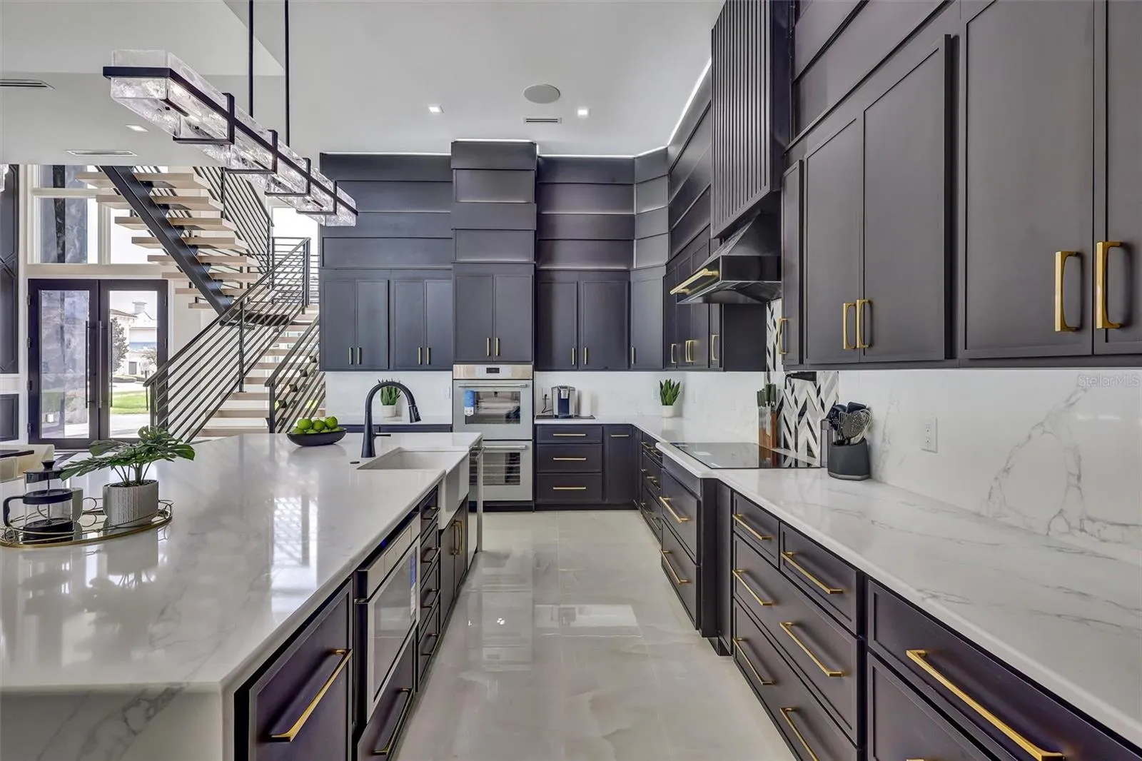 Custom cabinetry, quartz surfaces and sophisticated designer finishes