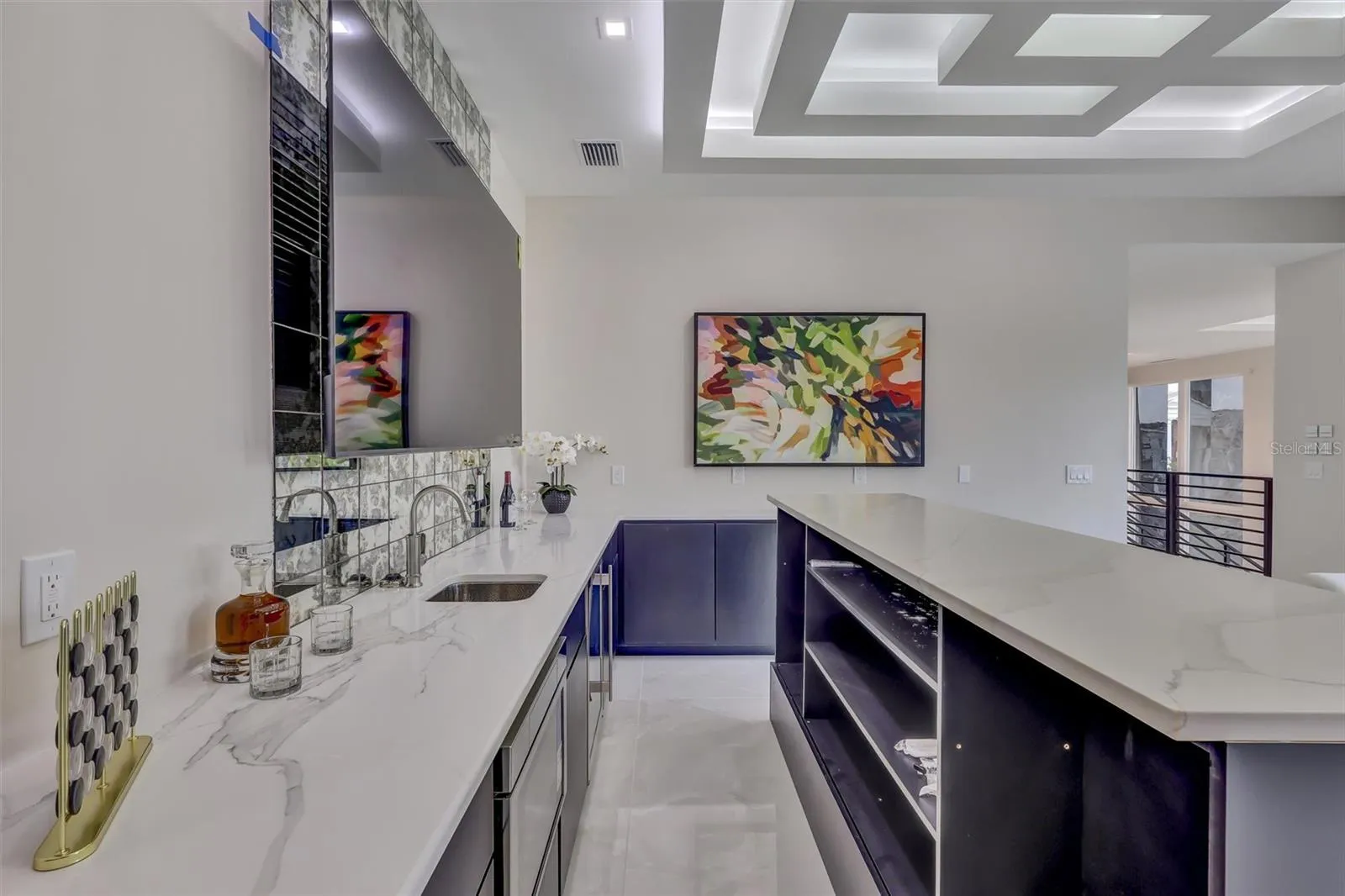 Custom wet bar with generous counter space and storage