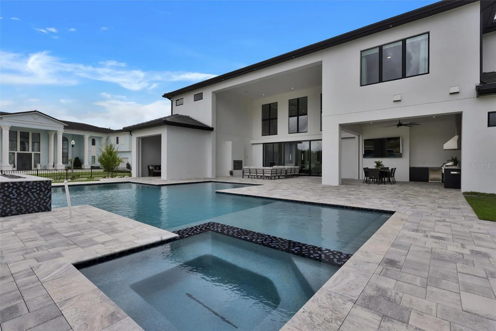 43-foot resort-style pool, spa and oversized sun shelf