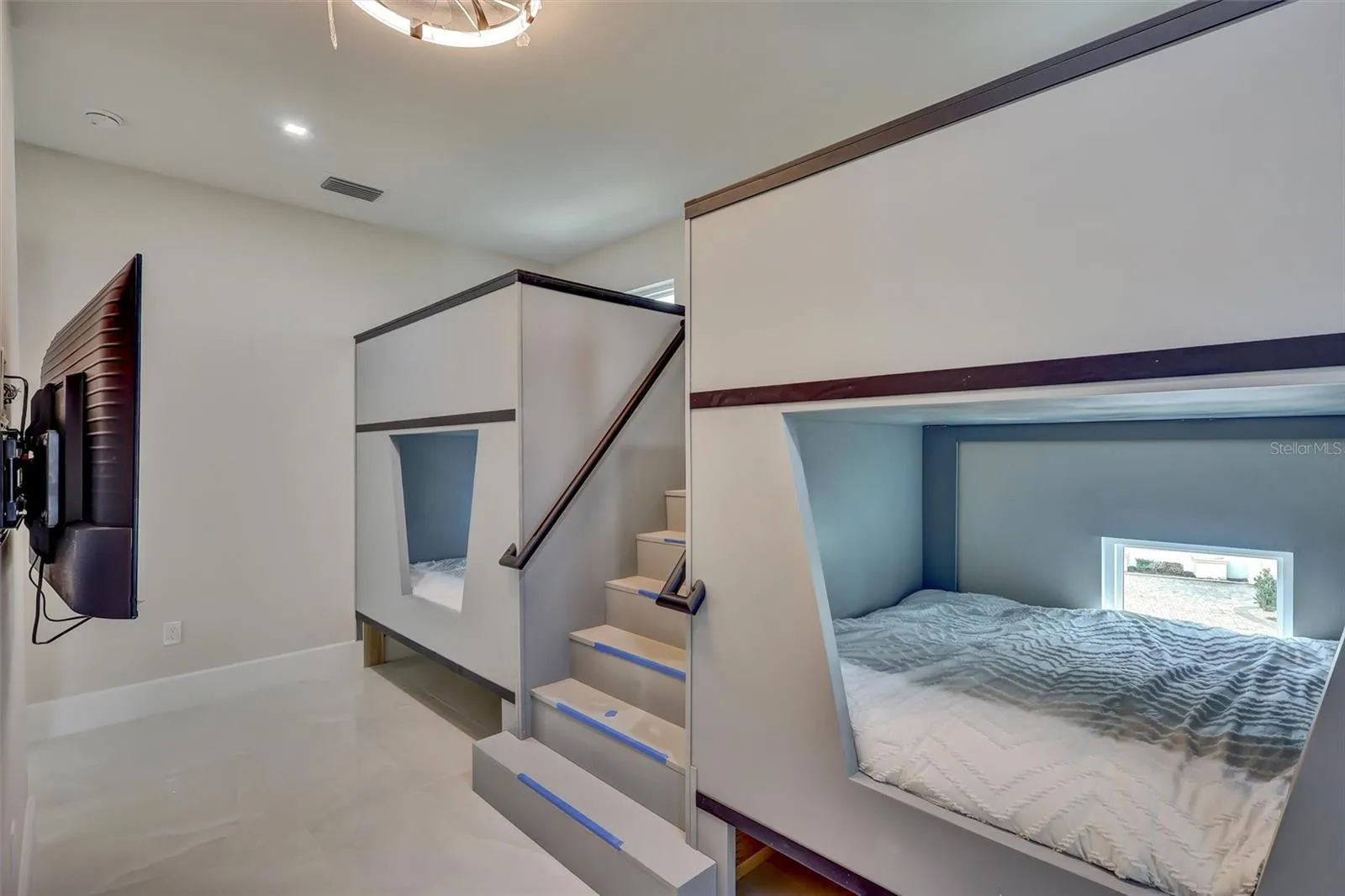 Architectural bunk structures create a one-of-a-kind guest retreat