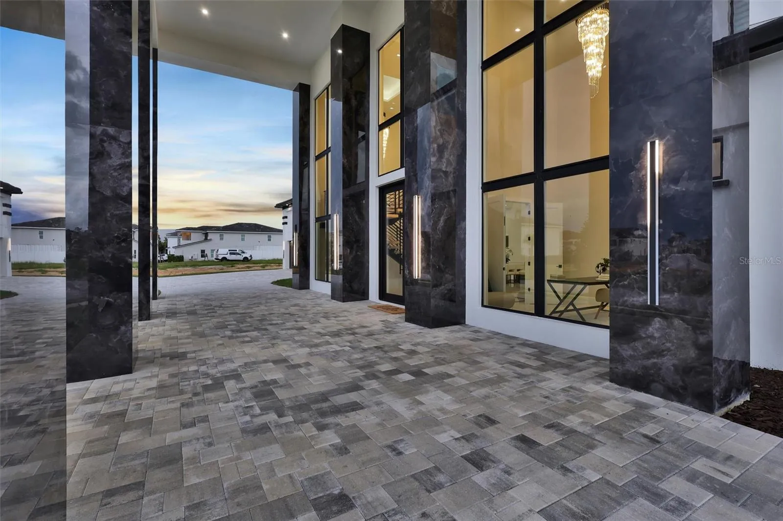 Covered Porte-cochere for sophisticated, sheletered staement arrival