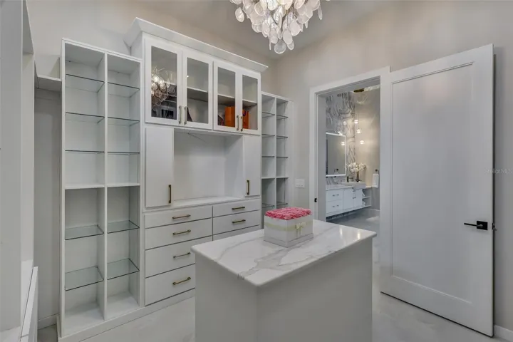 Beautifully appointed dressing room combines display, storage and organization