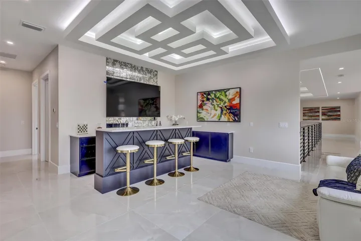 Sophisticated second-floor gathering space designed for entertaining