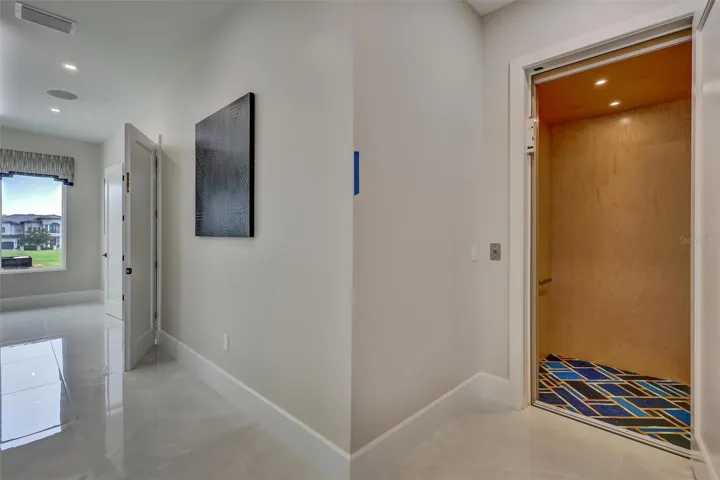 rivate residential elevator provides convenient access between levels