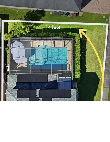 Photo is Virtually enhanced.                 The hedges can be removed to allow for fencing around the entire property, with plenty of additional yard space behind them to create your own private oasis.