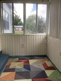 Enclosed front porch.