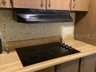 Cook top with vent hood.