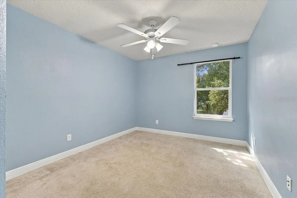 Secondary bedroom with double closet, easy access to the hallway