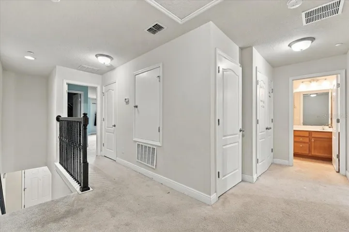 Upper-level hallway providing convenient access to the bedrooms.