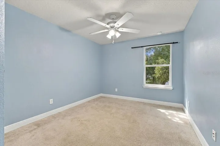 Secondary bedroom with double closet, easy access to the hallway